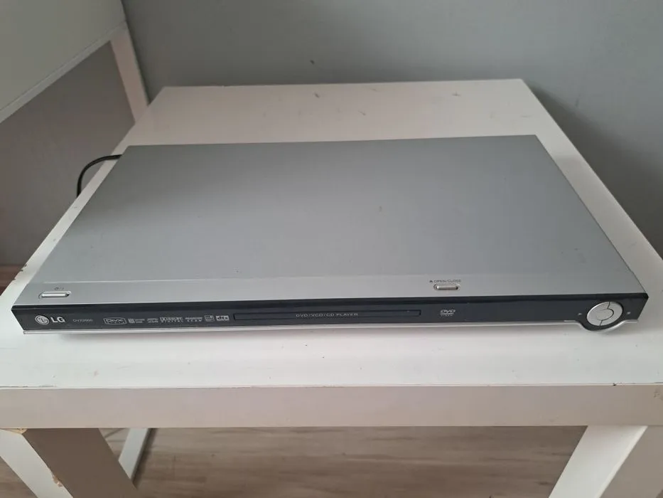 DVD / DivX Player Yamada DVX-6700, Suport MPEG-4 / MP3, Ieșire SCART, Optical & Coaxial, Argintiu