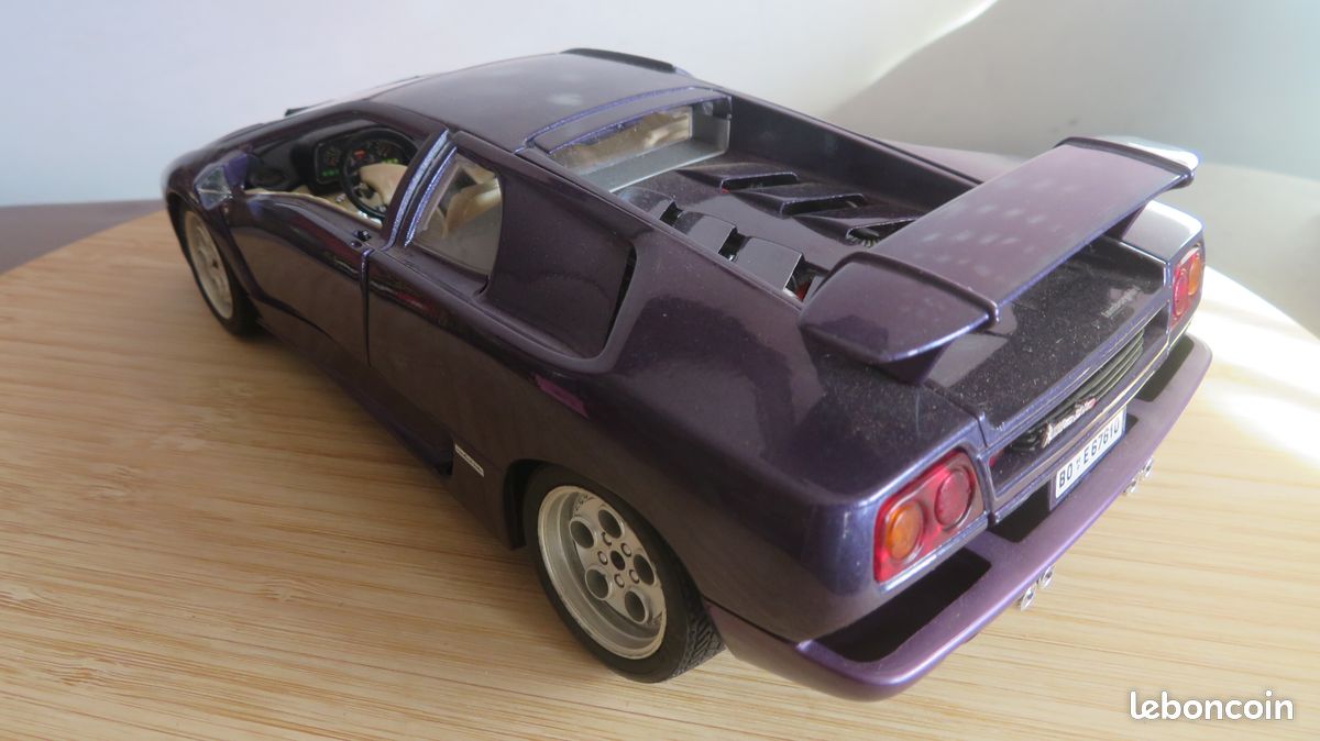 Macheta Auto Colectie Bburago Lamborghini Diablo 1990 Scara 1/18, Mov - imagine 2